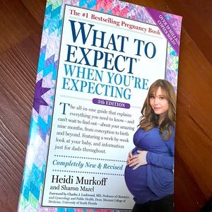 What to Expect When You're Expecting soft cover book meant for pregnancy info.